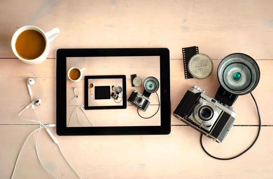 Stylish lifestyle photo showcasing a fashion magazine and tablet with a fashion website, ideal for e-commerce themes.
